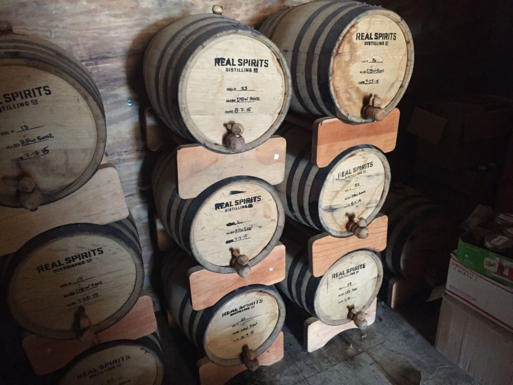 Real Spirits barrels filled with whiskey for cocktails
